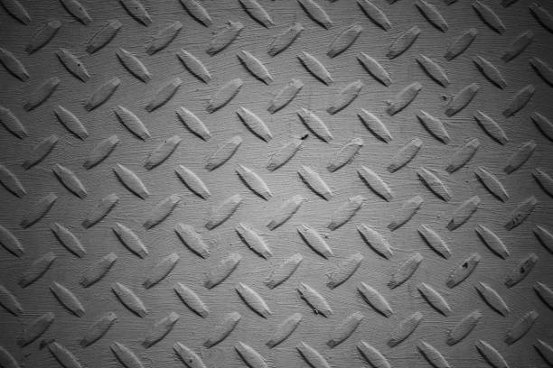 istock black and white texture of metal plate with abstract relief patterns 1272929617