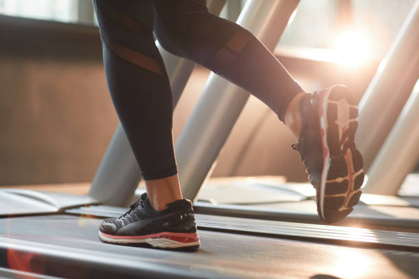 istock Woman running on treadmill 1272933509