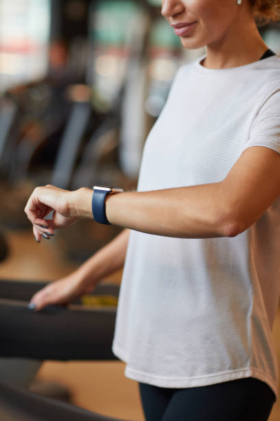istock Sportive woman checking her pulse 1272933570