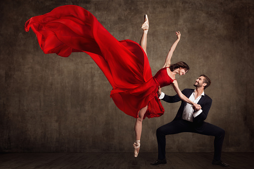 Ballet Couple Dance, Beautiful Woman in Red Dress and Man in Suit, Ballerina in Fluttering Flying Fabric