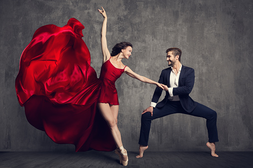 Dancing Ballet Couple, Beautiful Woman Ballerina in Red Dress and Man in Black Suit, Ballerina in Flying Waving Fabric