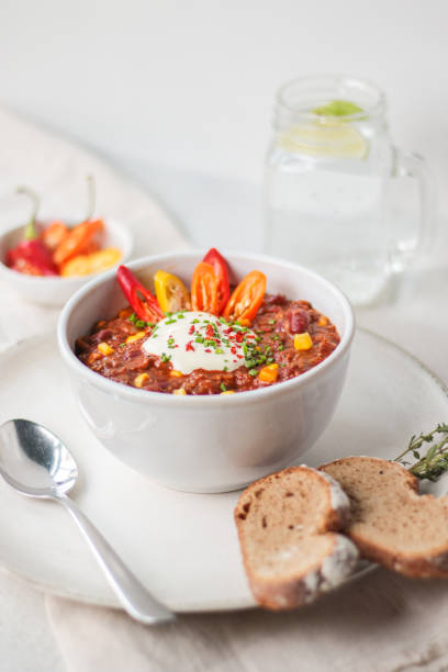 istock Traditional Chili Con Carne in Soup Bowl 1272938262