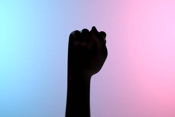 istock Female Hand Fist, Neon Lights 1272942804