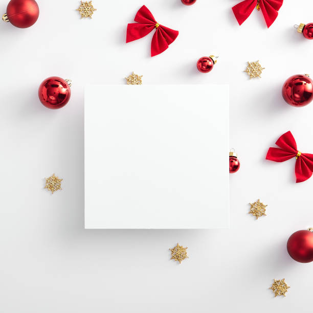 istock Red christmas ball and gold snowflake with empty paper blank 1272943559