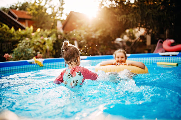 funny summer day - above ground pool imagens e fotografias de stock