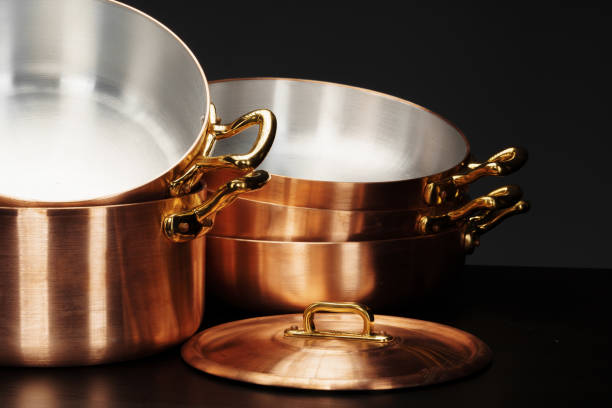 istock Set of copper cookware over dark background 1272946259