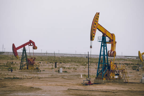 istock Oil pump jack in operation 1272947720