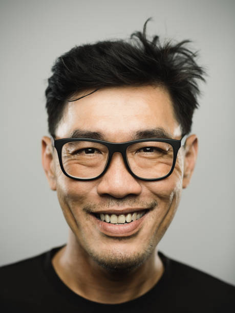istock Portrait of a real chinese man with happy expression 1272948278