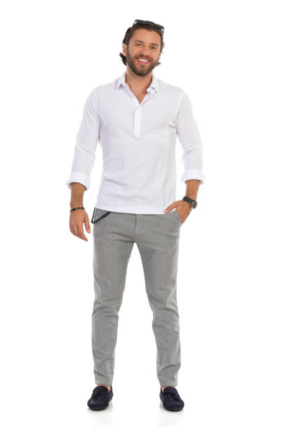 istock Relaxed Elegant Handsome Man Is Standing With Hand In Pocket 1272949496