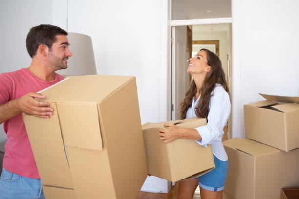 istock Excited young couple moving into new flat 1272952698