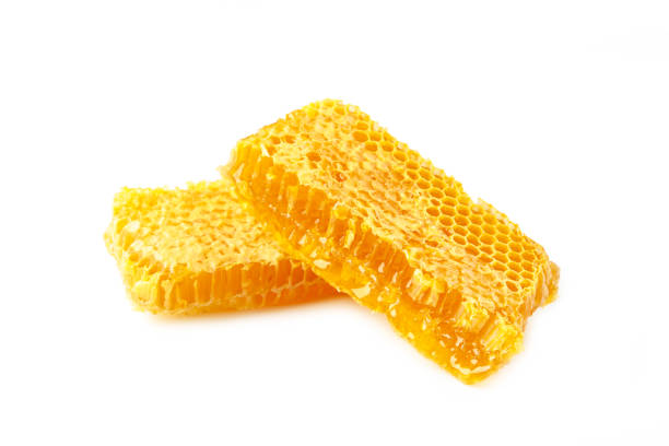 istock Sweet honeycomb isolated on white background. Top view 1272954846