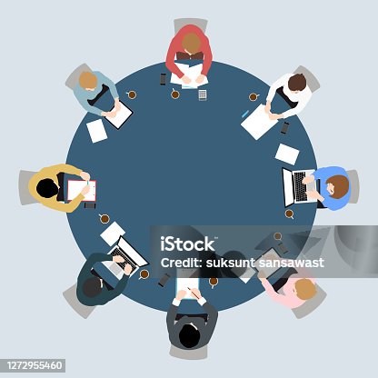 istock Business meeting top view on circle  table conference office team . 1272955460