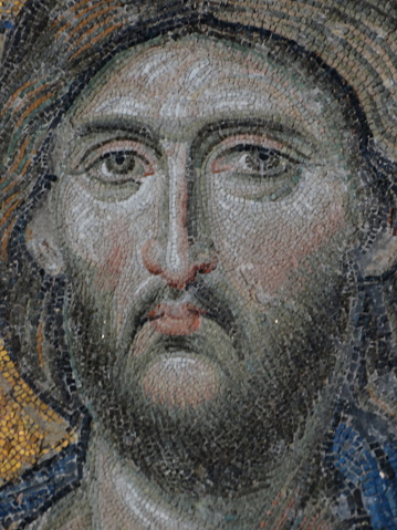 Hagia Sofia, Istanbul, Turkey - July 21, 2012: Mosaic of Jesus Christ found in the old church of Hagia Sophia in Istanbul, Turkey. Constructed during Byzantine era.