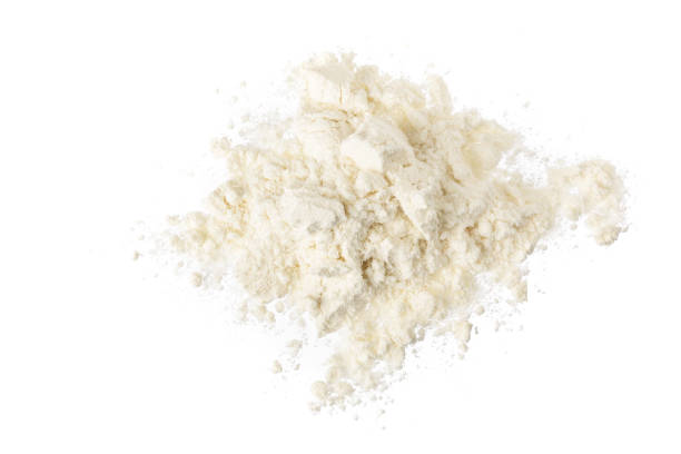 istock Pile of flour isolated on white background. Top view. Flat lay 1272956912