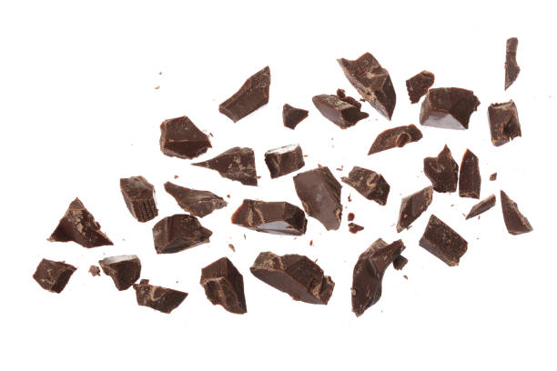 istock grated chocolate isolated on white background. Top view 1272956913