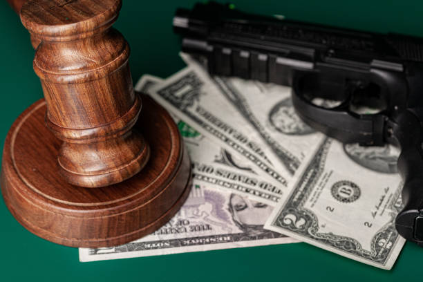 istock Law mallet and a stack of money 1272958880