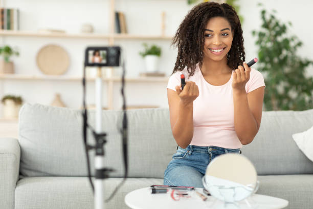 istock Black Girl Making Makeup Video Tutorial For Beauty Blog Indoor 1272959008