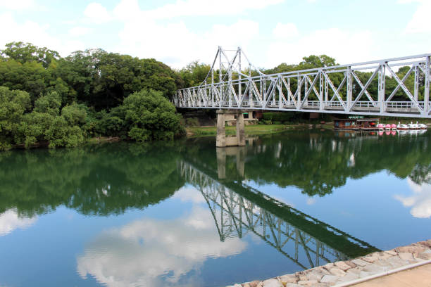 istock Bridge connecting Okayama Garden and its reflection 1272959049
