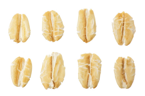 istock oat flakes isolated on white background. Top view. Set or collection 1272960930