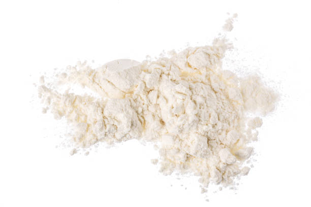 istock Pile of flour isolated on white background. Top view. Flat lay 1272960948