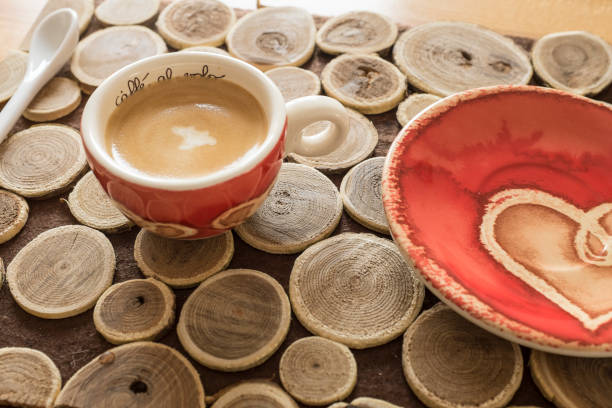 istock a cup of coffee on a wood table 1272961877