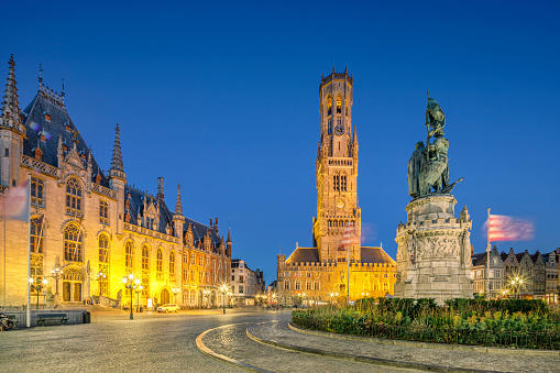 Bellfry, City Hall and Statue of Jan Breydel and Pieter De Coninck at Market Square in Bruges, Belgium.