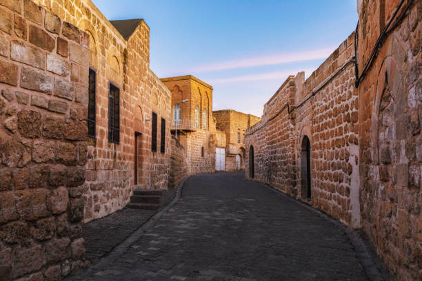 An Alley in the Old Town of Midyat, Mardin, Turkey Midyat is an old town in Mardin Province of Turkey. The ancient city is the center of a centuries-old Hurrian town in Southeast-Turkey midyat photos stock pictures, royalty-free photos & images