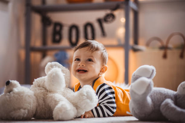 istock Baby in costume crawling on Halloween 1272966375