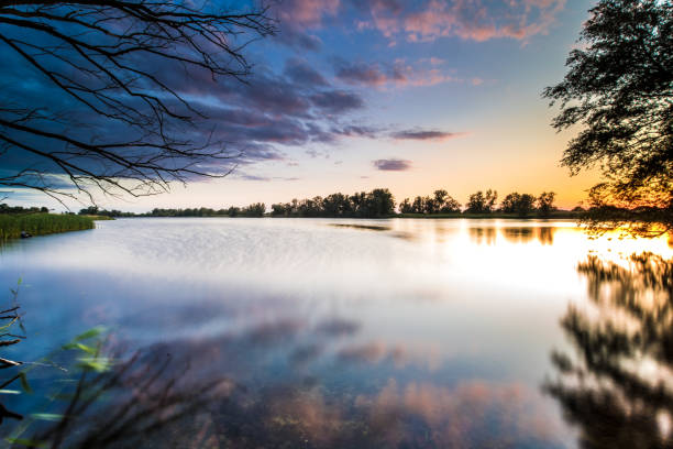 istock Atmospheric sunset on the lake 1272966631