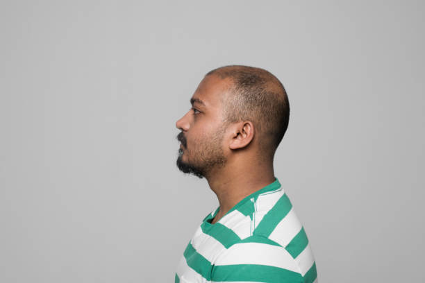 istock Side view of mid adult man 1272968440