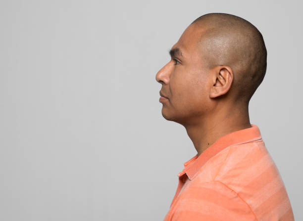 istock Side view of mid adult man 1272968512