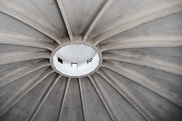 istock Old dirty concrete dome in an old industrial building 1272976422