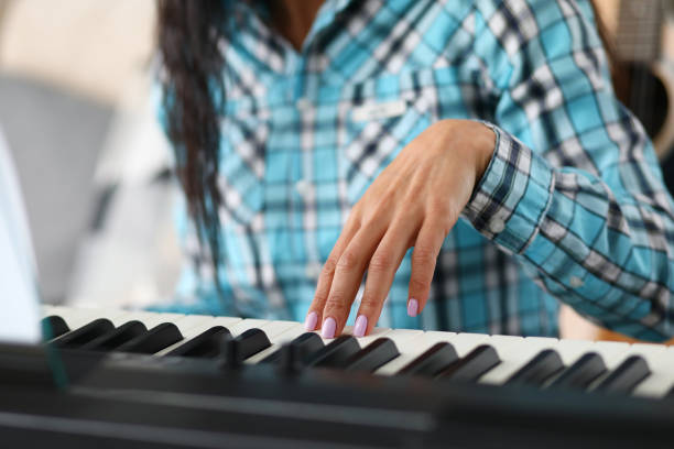istock Teacher giving music lesson 1272976703
