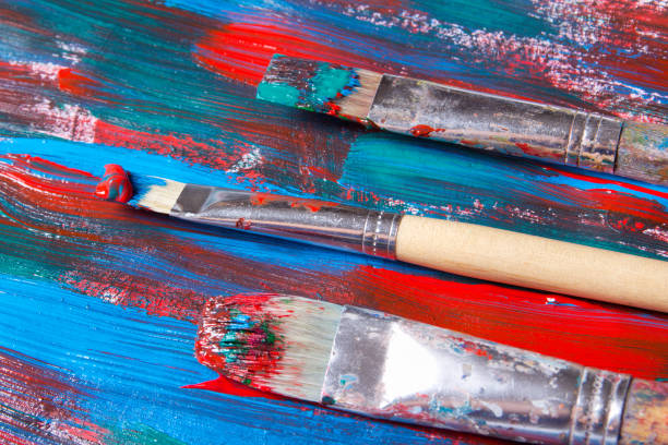 istock brushes and acrylic paint background with blue and red strokes 1272976959