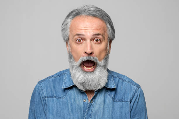 istock Portrait of surprised mature man 1272977808