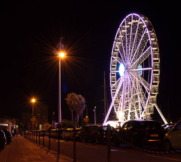 도로에서 보기 - 밤에 관람차는 - ferris wheel wheel night neon light 뉴스 사진 이미지