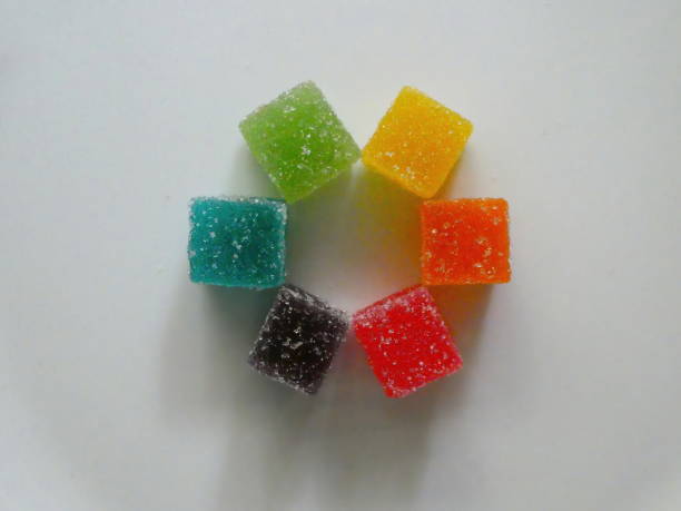 istock Circle of colorful sugar coated jelly sweets 1272977876