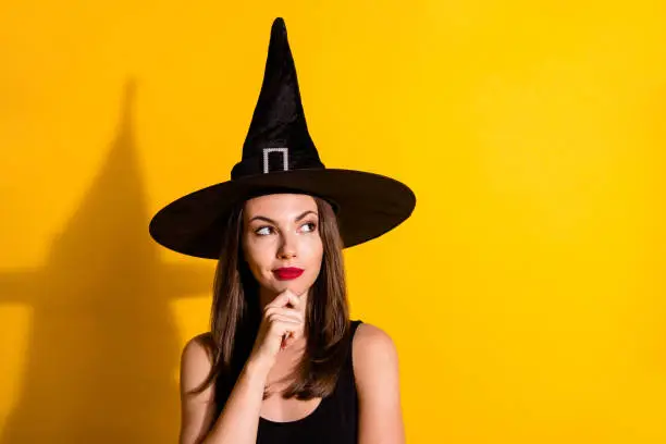 Photo of Close-up portrait of her she nice-looking attractive pretty glamorous minded lady wizard deciding clue copy space touching chin isolated on bright vivid shine vibrant yellow color background