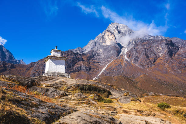 istock Buddhist stupa and Khumbu Yul Lha mountain. Nepal 1272979511