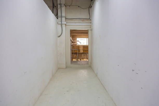 istock Long corridor in an industrial premises 1272980175