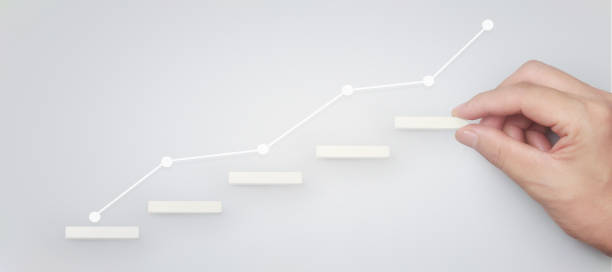 istock Block stacking as step stair in hand. Business concept for growth 1272981458