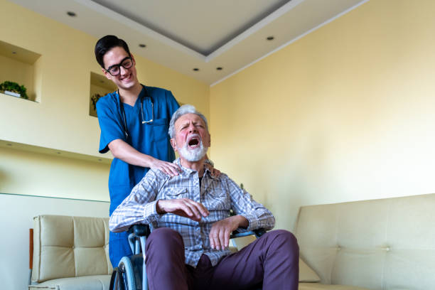 istock Young Caregiver is Helping a Disabled Person 1272981467