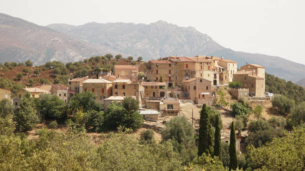 Borgo village set on top of a hill in the countryside of the Palasca region of Corsica Island, France. stock photo