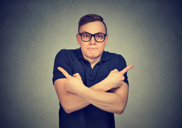 istock Portrait of confused young man 1272983507