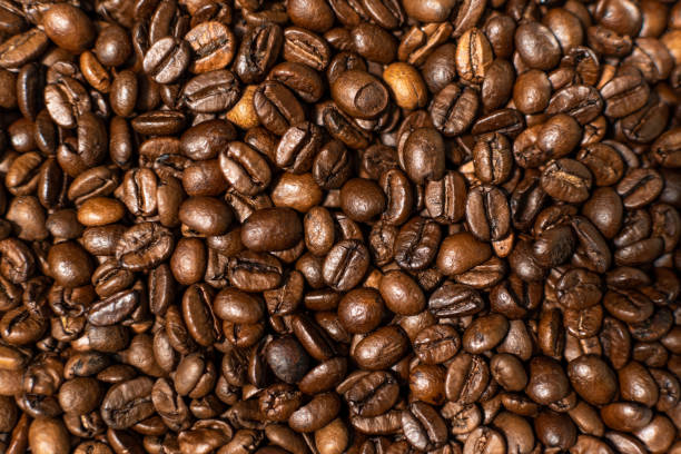 istock Close-Up of Roasted Coffee Beans Background 1272987842