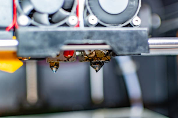 istock Close-up of a 3D Printer Extrusor 1272987878