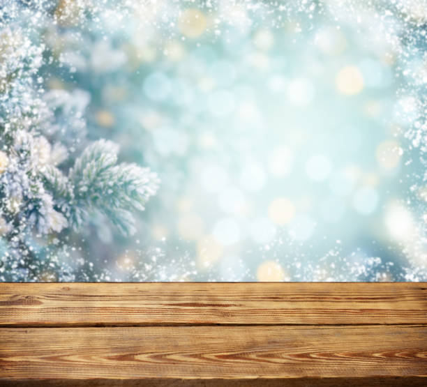 istock Christmas tree branches with wooden background 1272988057