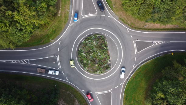 istock Roundabout with cars 1272990215