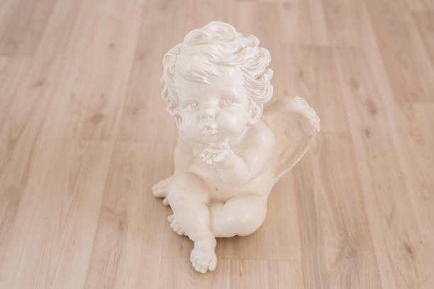 istock figurine and interior concept - white ceramic angel 1272991908