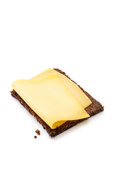 istock Rye Bread with cheese.  Pumpernickel bread isolated on white background 1272992264